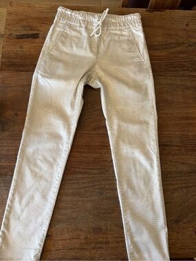 Flog joggers with a silver sheen snake like print